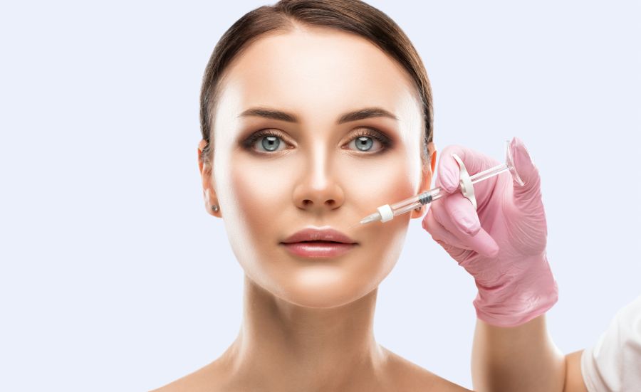 Cosmetologist Does Injections For Lips Augmentation And Anti Wri